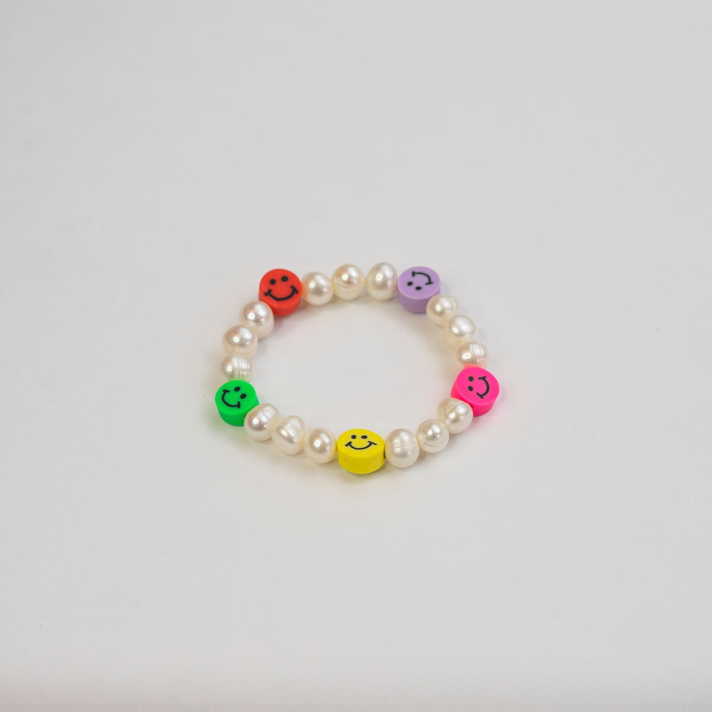 Pulsera Happy face con perlas