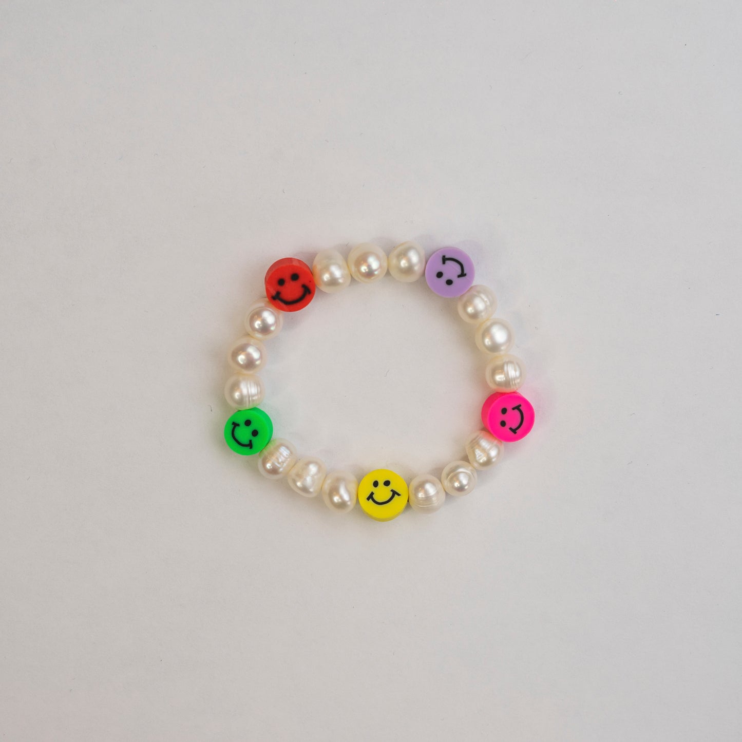 Pulsera Happy face con perlas